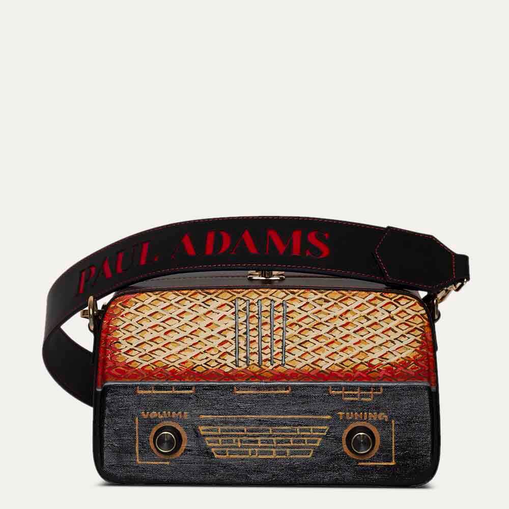 Black sling bag for women with original handpainted pop art on canvas. Available at Paul Adams World.