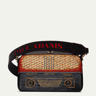 Black sling bag for women with original handpainted pop art on canvas. Available at Paul Adams World.