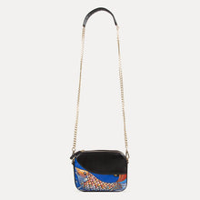 Load image into Gallery viewer, Ella sling bag with adjustable shoulder strap. Shop at the would of Paul Adams.