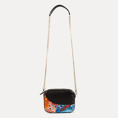 Zoe sling bag with adjustable shoulder strap. Available at the world of Paul Adams.